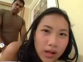 Young Thai girl Nat gets pumped full of African semen
