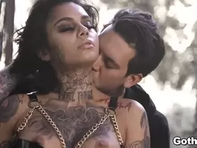 Tattooed Goth babe Genevieve Sinn gets an awesome outdoor ANAL fucking adventure at the cemetery.