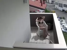 Spying my teen neighbour masturbating on her balcony
